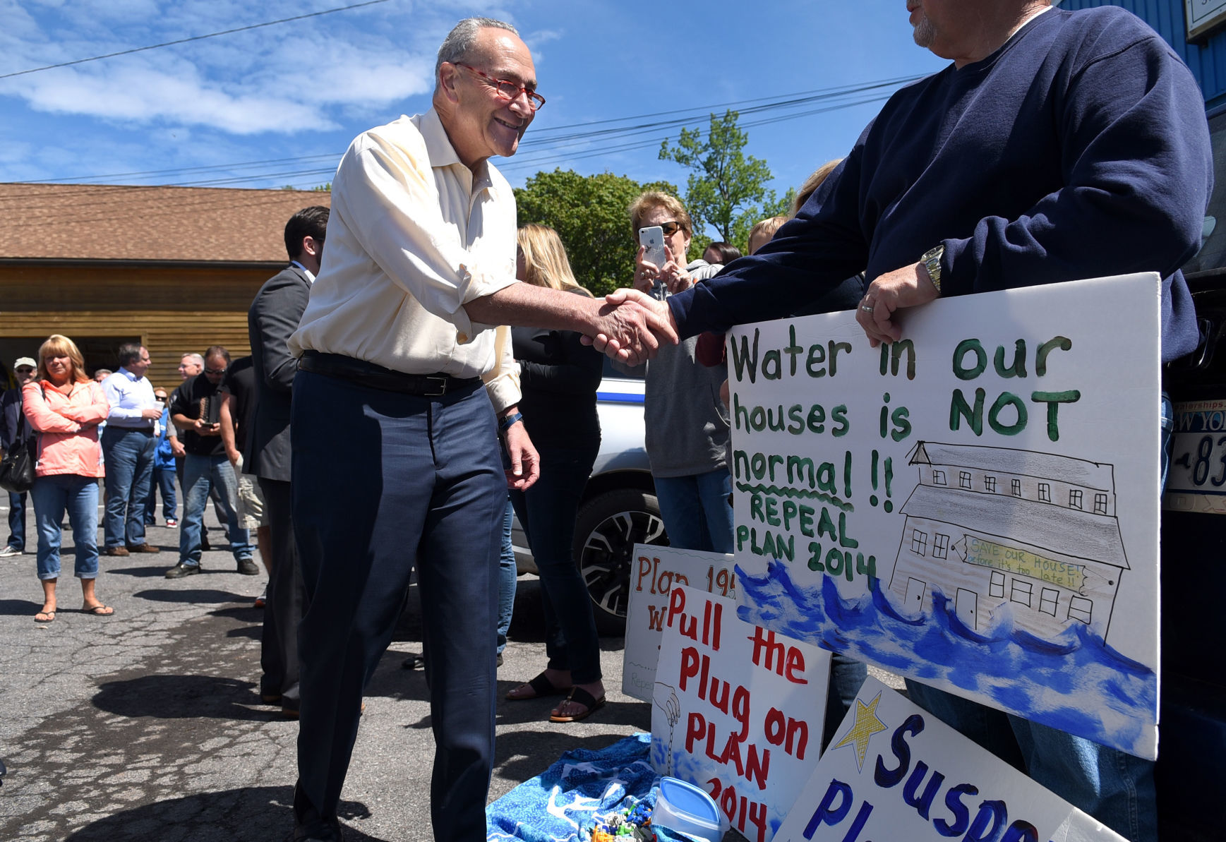Schumer tours flood damage 2.JPG